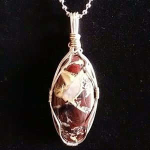 Rainbow Jasper necklace with quartz pocket